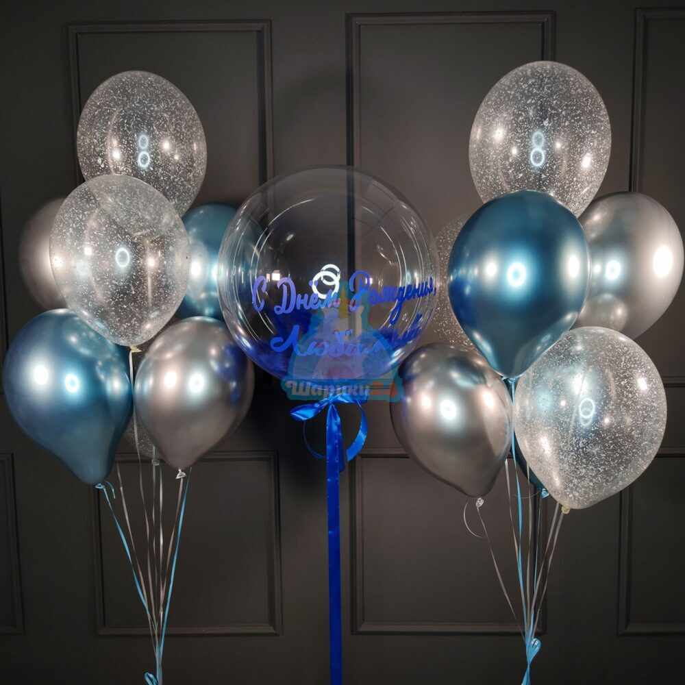 Композиция с баблом с синими перьями и двумя фонтанами из шаров